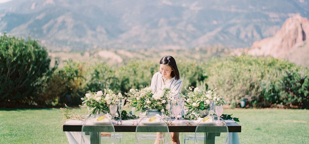 Keestone planner at work at a destination event set against the mountains